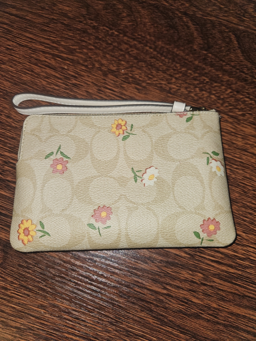 Coach Beige Signature Floral. Corner Zip  Wristlet